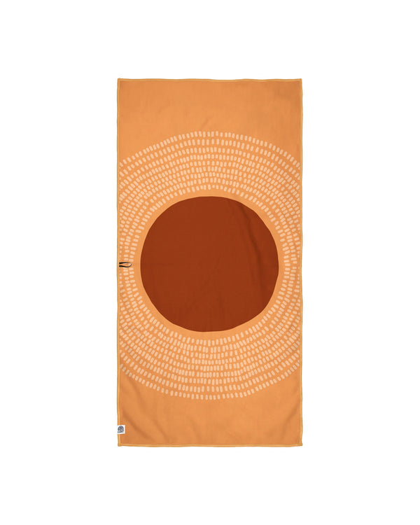 Orange Alpenglow Wander Towel with unique double-sided design and built-in hanging loop, super absorbent and sand-resistant.