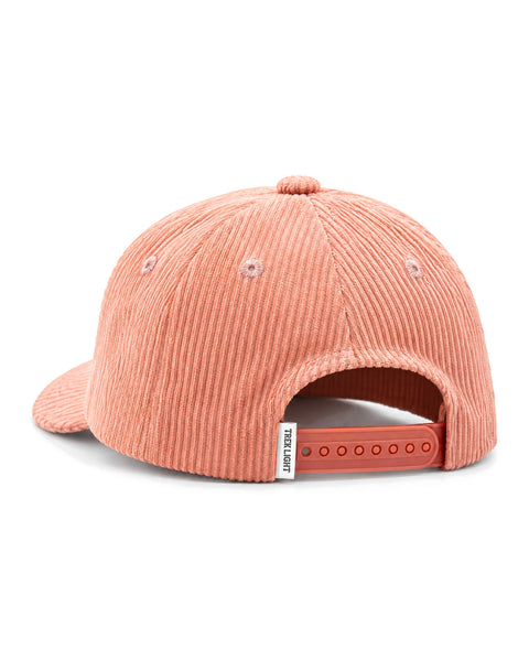 Back view of the Be The Light Hat, a terracotta orange corduroy cap with a pink snapback strap, on white.