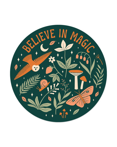 Believe In Magic Sticker, a round dark green design with orange text, an owl, moth, mushrooms and leaves, on white.