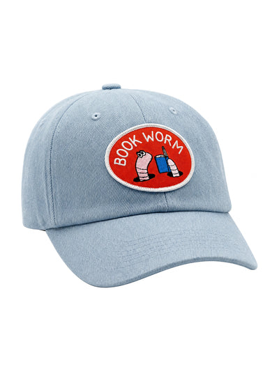 Book Worm Hat featuring a playful design with a blue fabric and embroidered patch.