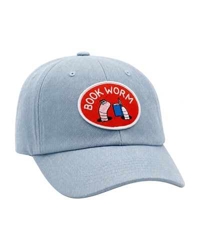 Book Worm Hat featuring a playful design with a blue fabric and embroidered patch.