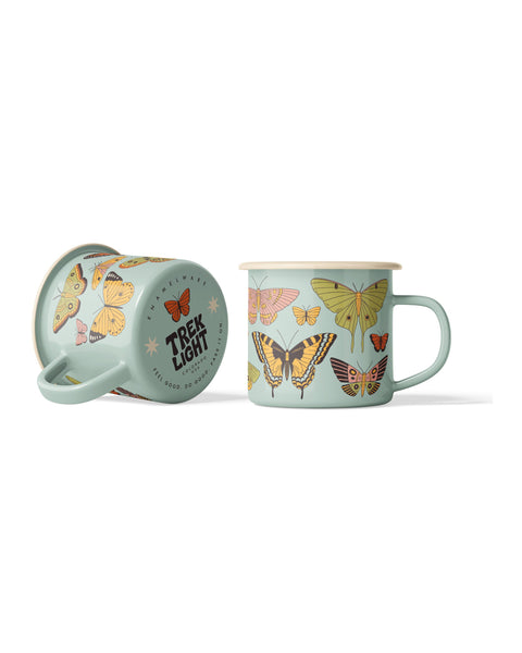 Sage green Butterfly Beauty enamel mug shown on its side next to upright mug, vintage butterfly and moth illustrations.