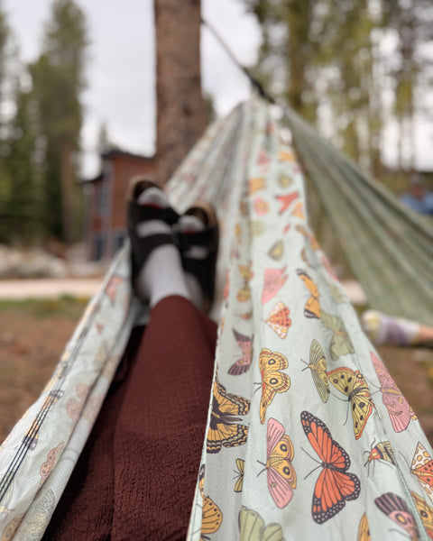 View from inside the Double Hammock in the Butterfly Dreams print at a pine campsite, Trek Light