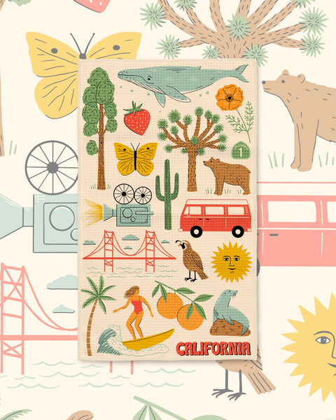 California Kitchen & Tea Towel with California icons like a surfer, camper van, bridge, bear and oranges on cream