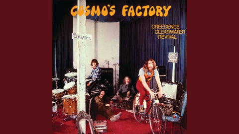 Creedence Clearwater Revival's Cosmo's Factory album cover featuring band members in a music studio.