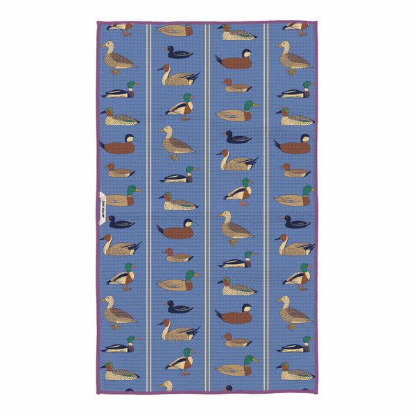 Ducks In A Row Kitchen & Tea Towel with vibrant duck pattern on blue background, made from eco-friendly recycled materials.
