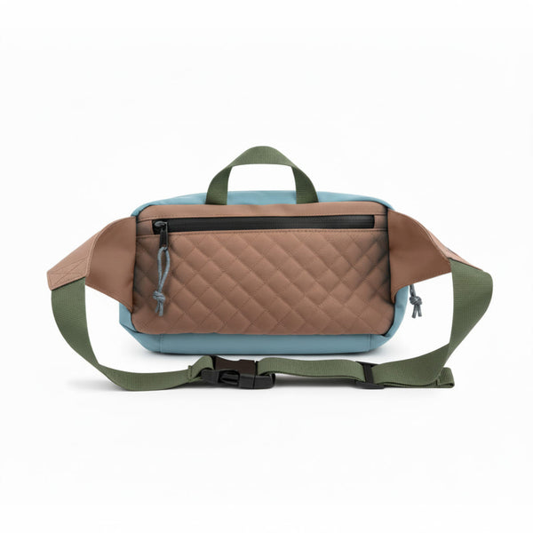 Everyday Fanny Pack (Golden Hour) in brown and blue with quilted design, adjustable strap, waterproof zippers, and multiple pockets.
