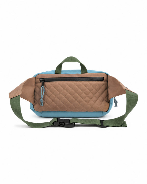 Everyday Fanny Pack (Golden Hour) in brown and blue with quilted design, adjustable strap, waterproof zippers, and multiple pockets.