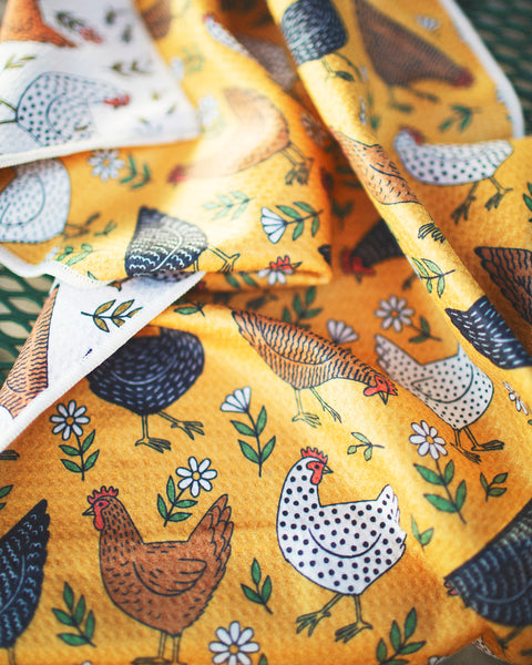 Farmhouse Chicken Kitchen & Tea Towel featuring colorful chicken patterns on a yellow background.