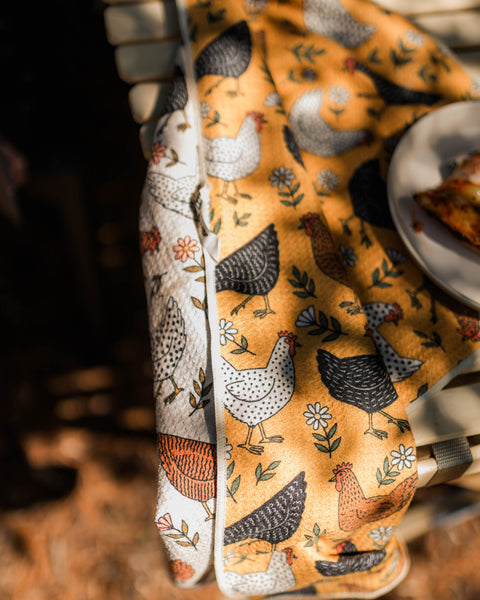 Farmhouse Chicken Kitchen & Tea Towel featuring colorful chicken designs on a vibrant background.
