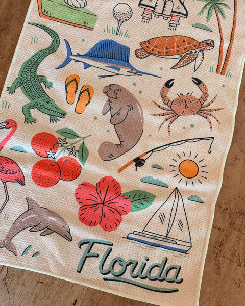 Florida Kitchen & Tea Towel featuring sunny illustrations and vibrant colors for a cheerful kitchen vibe.