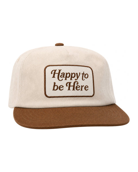 Happy To Be Here Hat featuring a beige cap with brown brim and embroidered text.