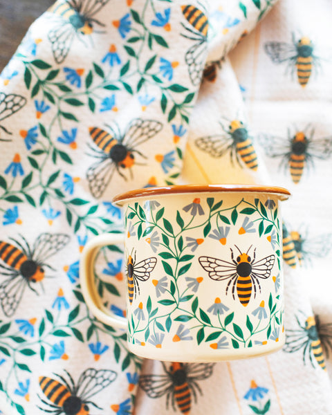 Honey Bee Kitchen & Tea Towel with decorative mug featuring illustrated honey bee design.