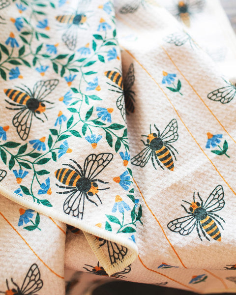 Honey Bee Kitchen & Tea Towel featuring vibrant bee and floral designs for eco-friendly kitchen use.