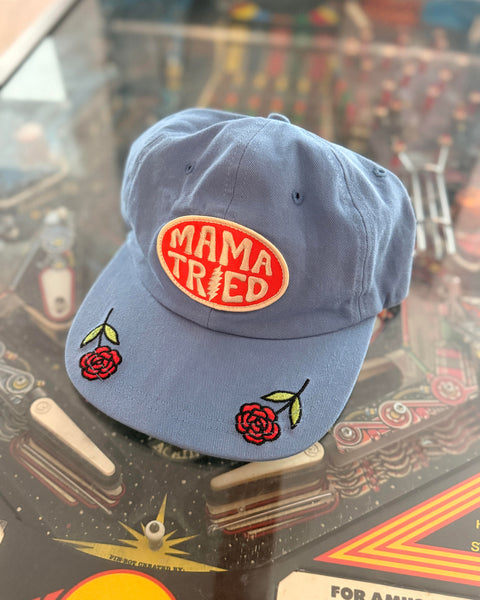 Mama Tried Hat featuring blue fabric with embroidered roses, designed for comfort and style.
