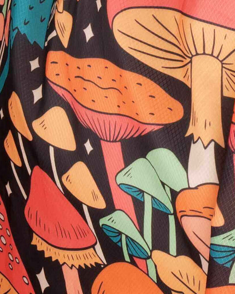 Close-up of the Double Hammock in Midnight Mushroom Print, colorful mushrooms and stars on black fabric.