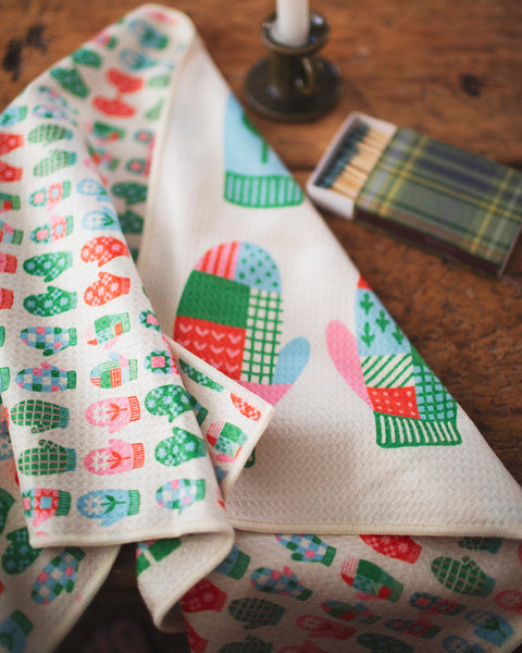 Colorful Mittens Kitchen & Tea Towel with vibrant patterns, made from 100% recycled materials, eco-friendly and quick-drying.