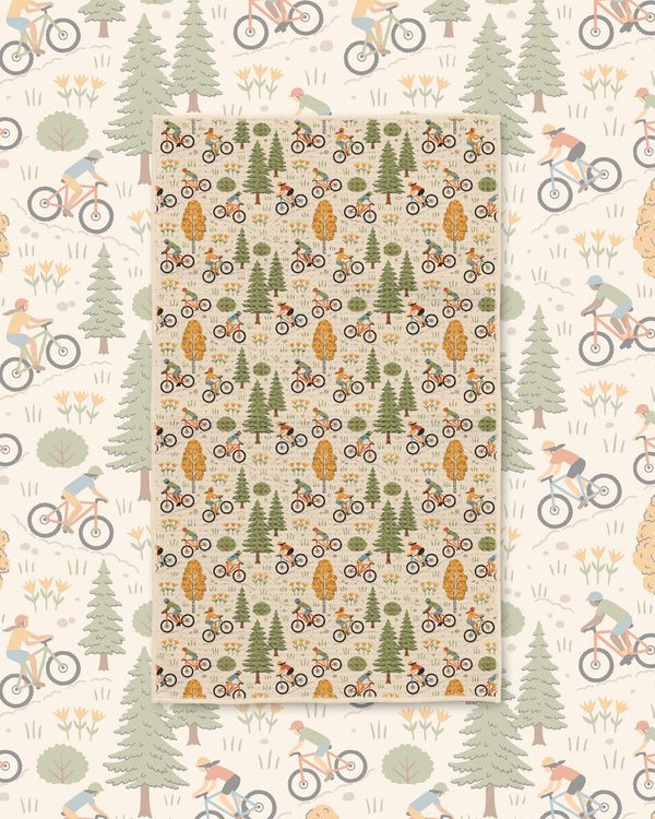 Mountain Biking Kitchen & Tea Towel featuring vibrant bike and nature patterns.