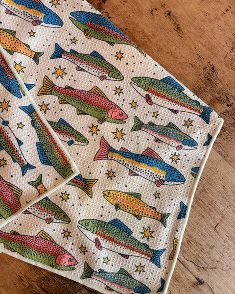 River Trout Kitchen & Tea Towel featuring colorful trout designs on a textured background, perfect for fishing enthusiasts.