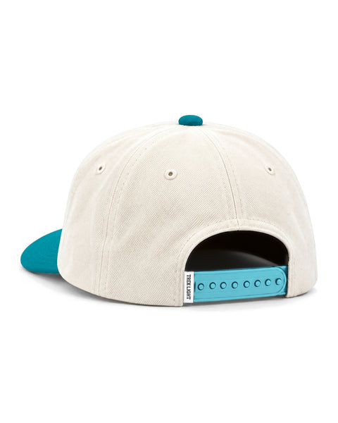 Rock N Roll Kids Hat in beige with a teal brim, teal snap strap and a small woven tag, on white