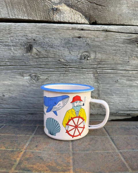 Salty Seas Enamel Mug 16oz featuring nautical designs including a whale, sailor, and shell.