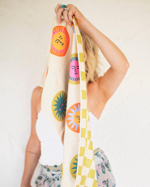 Always Sunny Kitchen & Tea Towel with vibrant sun designs, perfect for adding sunshine to your kitchen everyday.