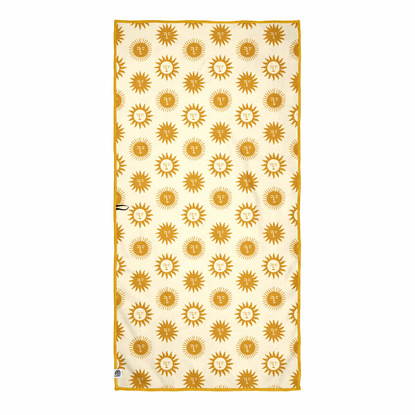 Sunny Wander & Travel Towel with sun pattern design, quick-dry and sand-resistant, made from 100% recycled materials.