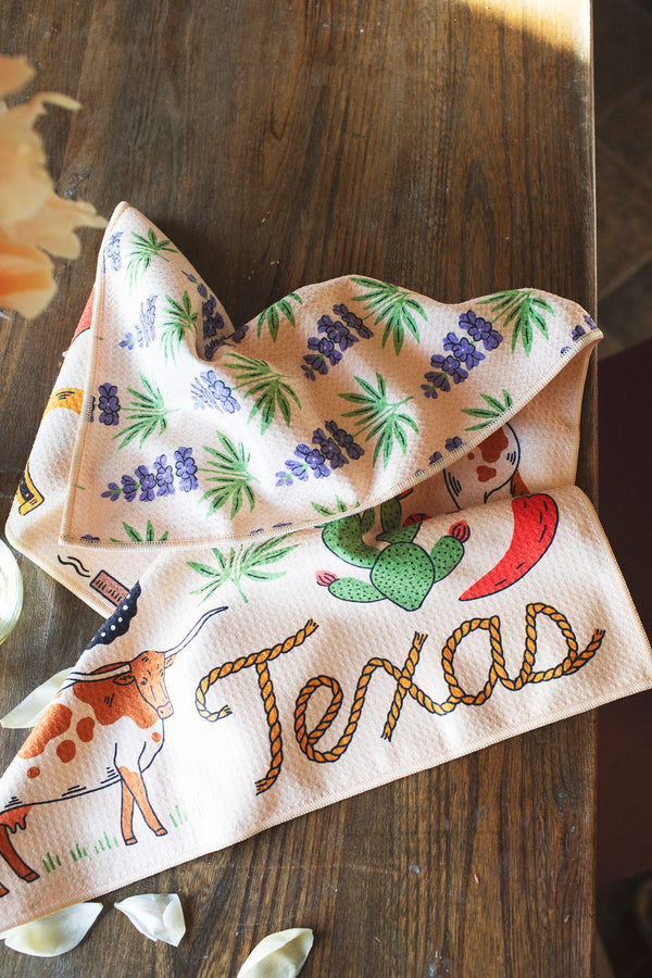 Texas Kitchen & Tea Towel featuring vibrant designs with Texas themes and eco-friendly fabric.
