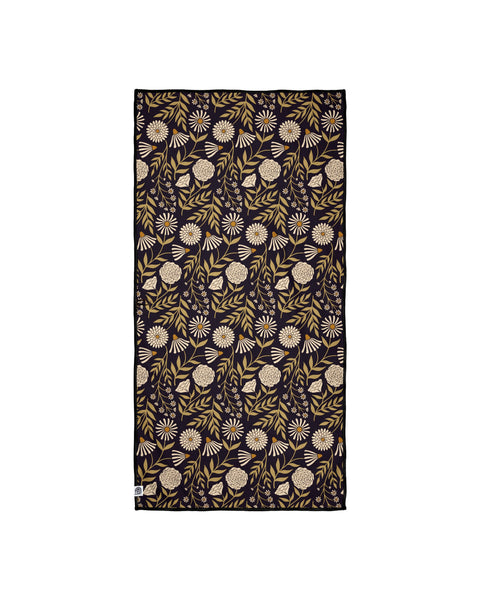 Travelin' Light Wander & Travel Towel with floral pattern, sand-resistant and quick-drying, made from recycled materials.