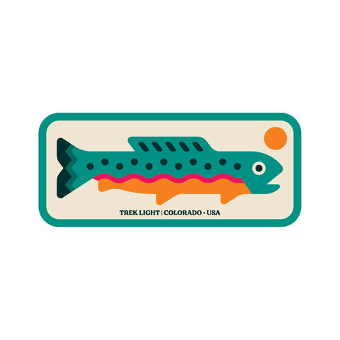 Colorful trout sticker, USA made, waterproof vinyl, 3x1.35 inches, featuring a stylized fish design with text 'Trek Light | Colorado | USA'.