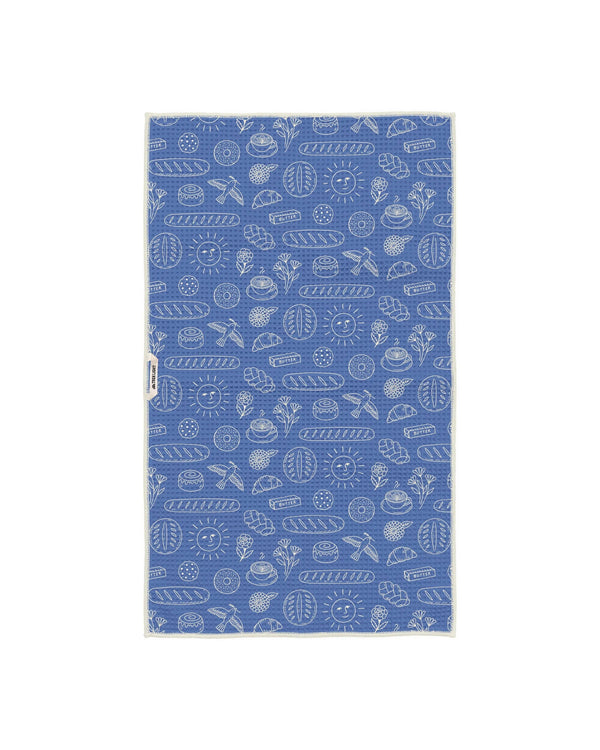 Wake & Bakery Kitchen Tea Towel with blue and white bread and pastry pattern design