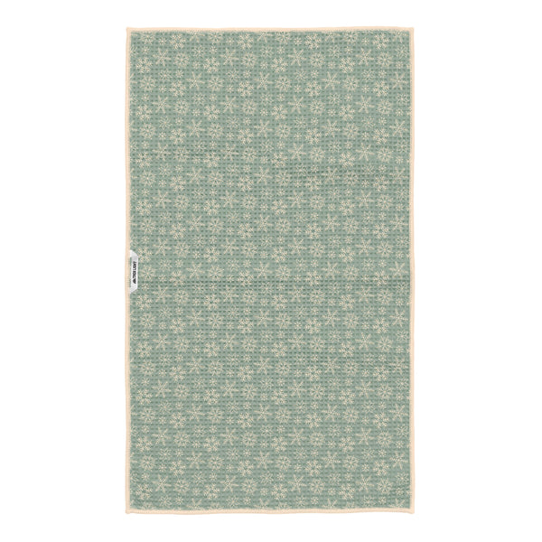 Reverse side of Winter Wonderland kitchen towel with cream snowflakes on sage green waffle-weave fabric and hanging loop