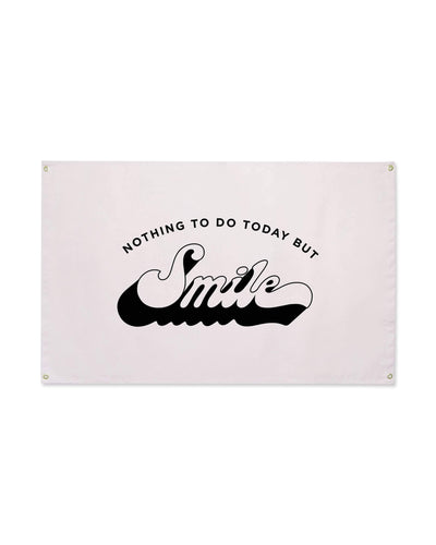 Trek Light 'Nothing To Do Today But Smile' Canvas Flag with handcrafted design and brass grommets for hanging.
