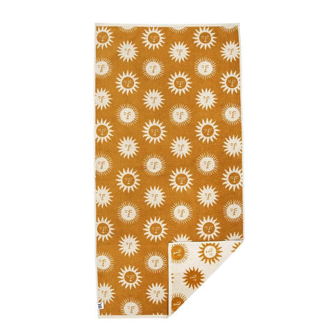 Sunny Bath Towel by Trek Light, 100% sustainable cotton with sun pattern, super soft and highly absorbent.