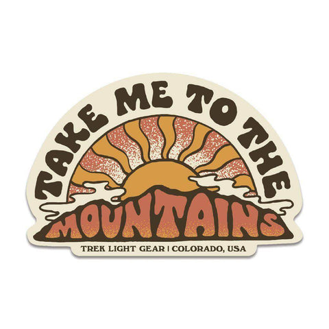 Trek Light Gear's "Take Me To The Mountains" sticker with sun and mountain design, made in USA, durable vinyl, 4x2.65 inches.