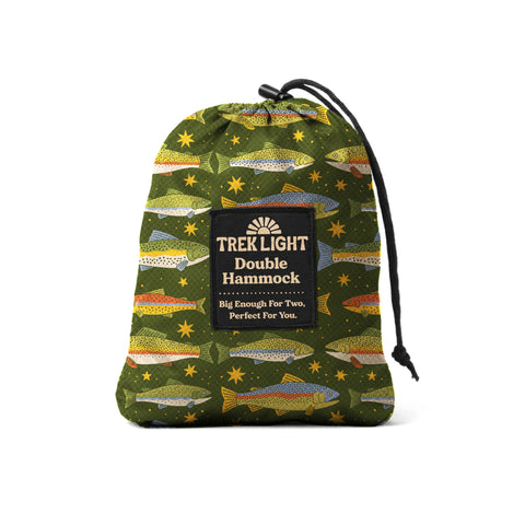 A Trek Light double hammock packed into its trout print stuff sack, small enough to travel with