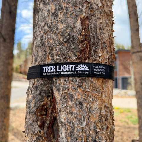 Trek Light hammock straps wrapped around a tree without damaging the bark