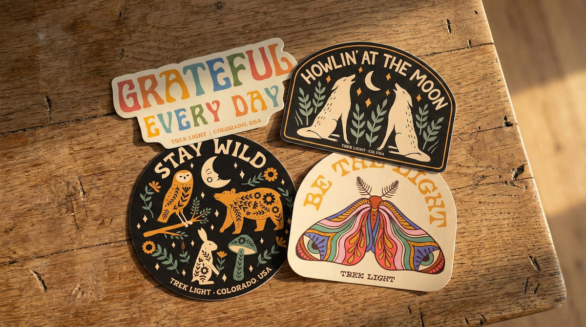 Collection of Trek Light stickers featuring outdoor and adventure themes on high-quality vinyl. Made in the USA, water-resistant.
