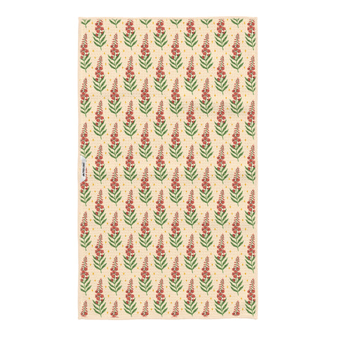 Back of Alaska kitchen tea towel with repeating red fireweed flower pattern on cream Grip-Tex fabric
