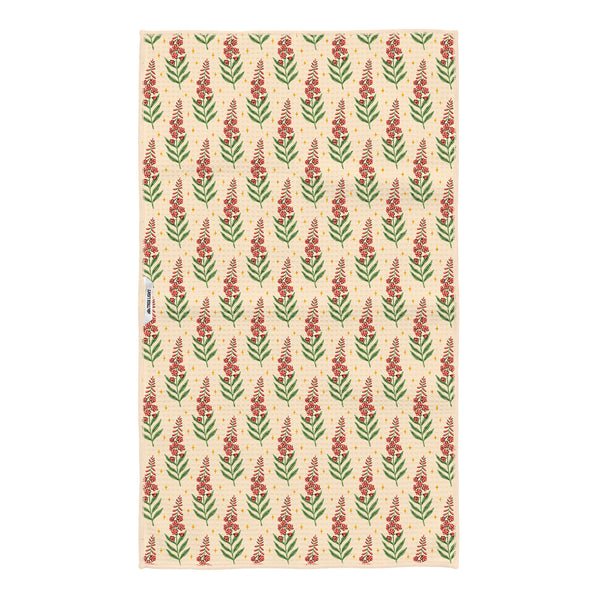 Back of Alaska kitchen tea towel with repeating red fireweed flower pattern on cream Grip-Tex fabric