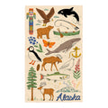 Alaska kitchen tea towel illustrated with bald eagle, orca, brown bear, moose, puffin, whale, salmon and totem pole on cream