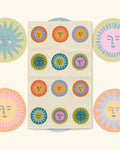 Always Sunny Kitchen & Tea Towel with smiling suns in orange, teal, pink and yellow on cream