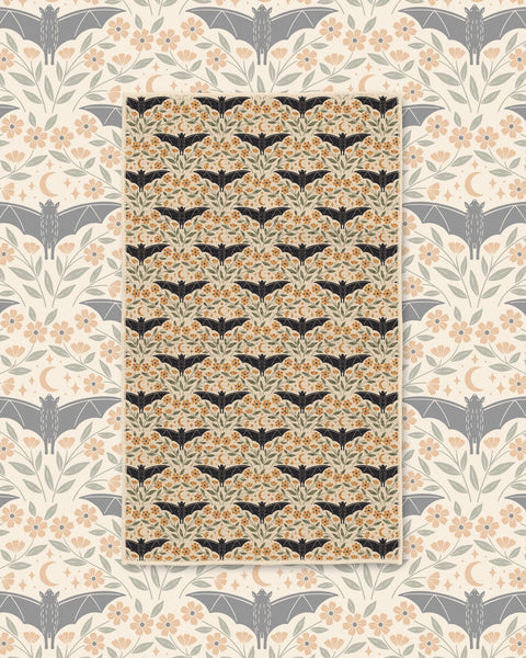 Bats & Blooms Kitchen & Tea Towel with black bats among tan and peach flowers