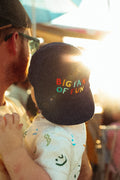 Child wearing a Big Fan Of Fun Kids Hat in a sunny outdoor setting, perfect for playground and parties.