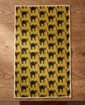 Black Cats waffle kitchen tea towel reverse side laid flat: mustard-yellow with black folk-art cats