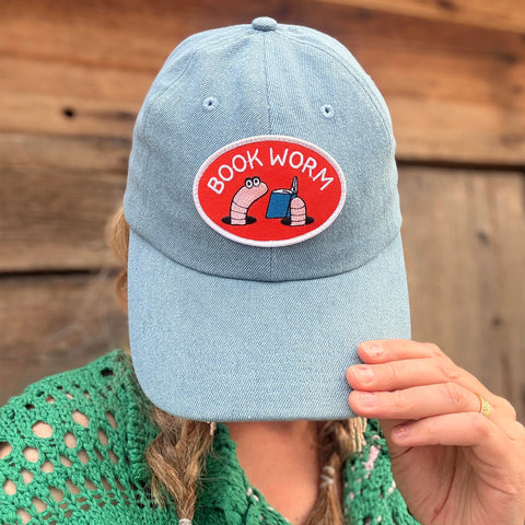 Book Worm Hat featuring cute bookworms, perfect for adding style and comfort to any outfit.