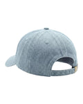 Back view of the Book Worm Kids Hat, a light blue washed denim cap with a metal buckle strap, on white.
