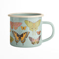 Handle-side view of Butterfly Beauty enamel mug featuring luna moth, tiger swallowtail, and pink moth illustrations on sage