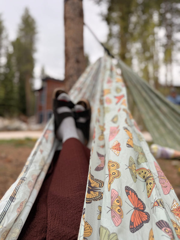 View from inside the Double Hammock in the Butterfly Dreams print at a pine campsite, Trek Light