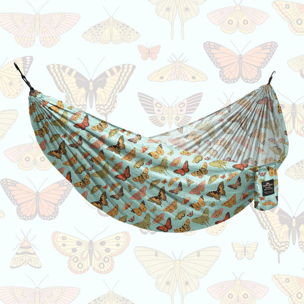 Double Hammock (Butterfly Dreams) - Hanging Straps Sold Separately with vibrant butterfly prints in a relaxing setup.